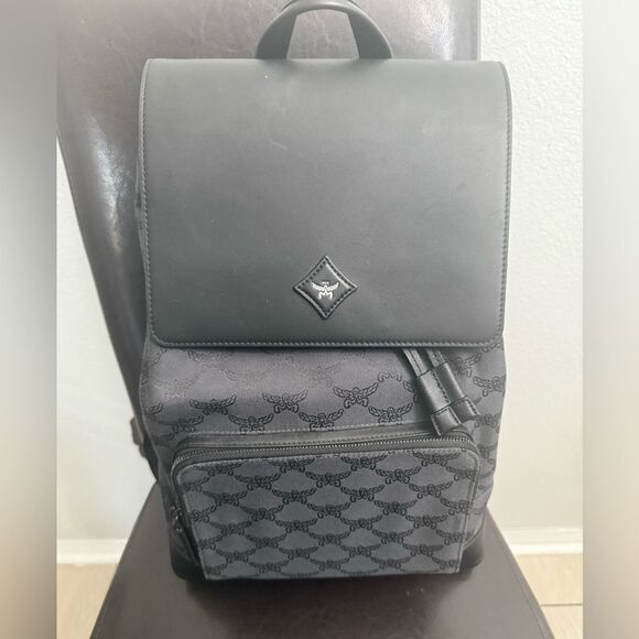 Brand new McmBlackBackpack / travel bag / diaper bag etc fits laptop